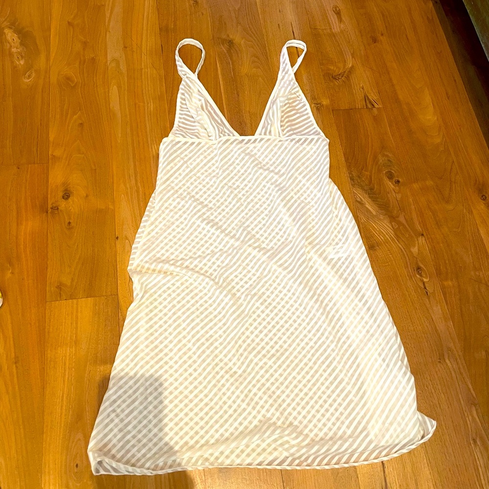 Risk lingerie in cream colored check.
